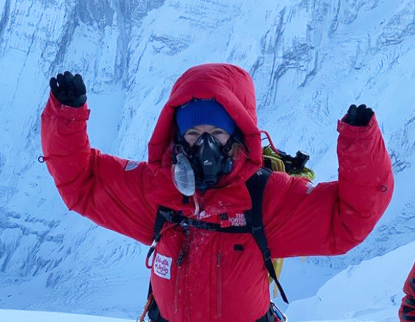 Climber on the summit of Annapurna