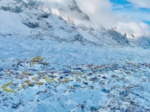 Hundreds of tents on the Khumbu glacier, the flank of Nuptse on the left.