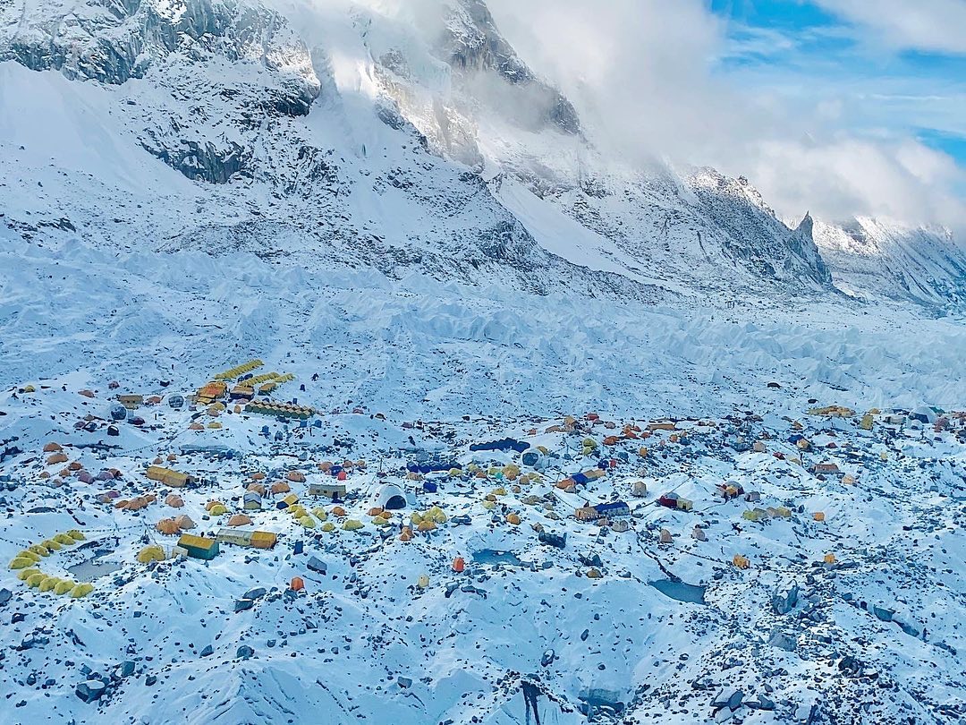 Hundreds of tents on the Khumbu glacier, the flank of Nuptse on the left.