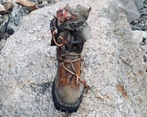 The old leather boot on a stone in Base Camp.