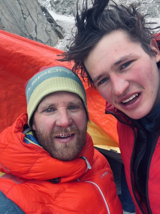 Close shots of the climbers looking weathered and cold.