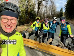 five middle-aged women cyclists