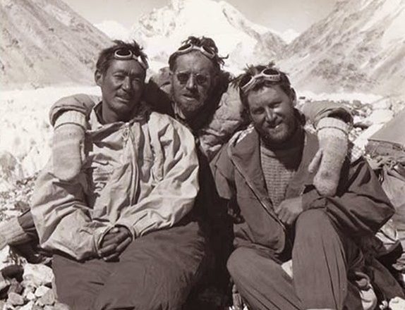 The clibmers in Base Camp, in a black and white image. 