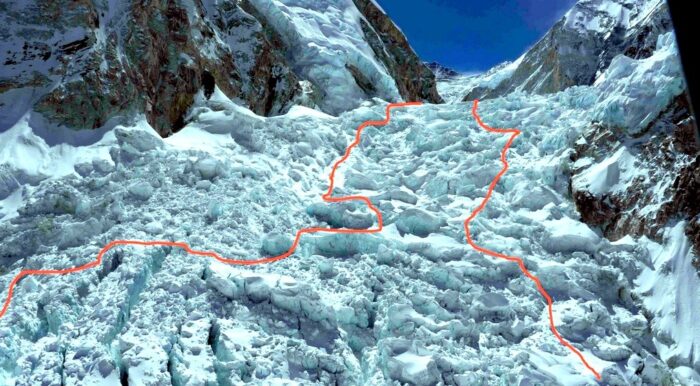 Photo of the Khumbu icefall with to red lines marking the routes used in 2014 and 2015
