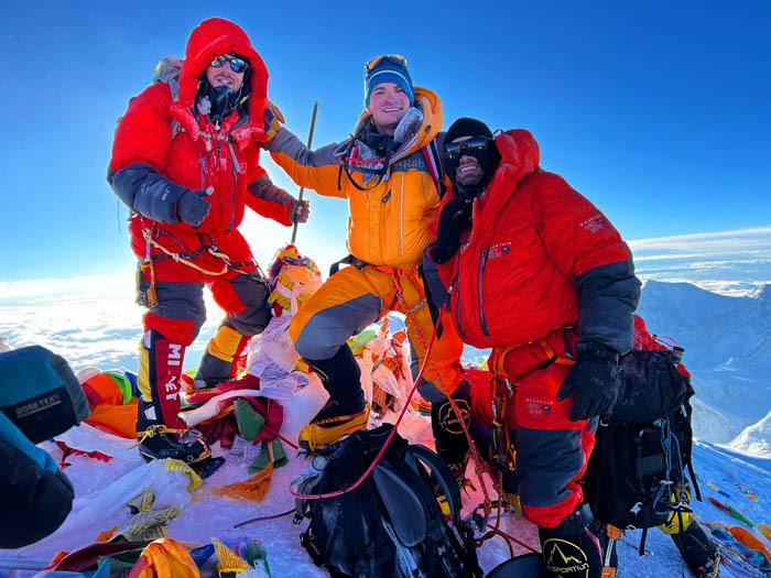 Climbers smile on Everest summit 