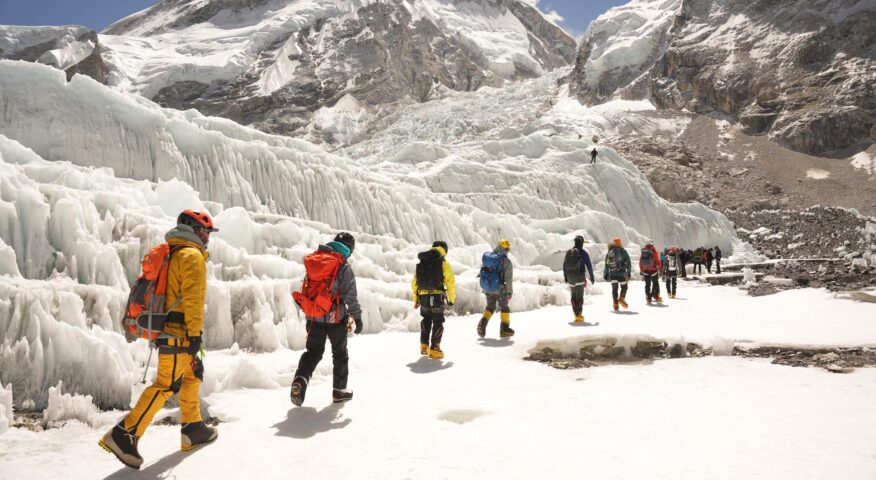 A line of climbers heading to the Khumbu Icefall on Everest