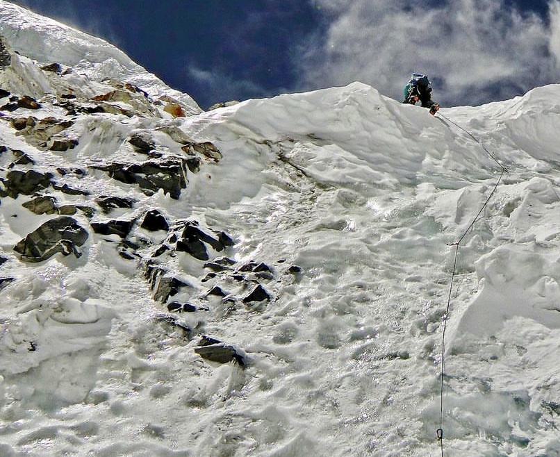 Ralf Dujmovits climbing the first pitch above the bergschrund at about 6,800m of the Japanese Couloir in 2010. 
