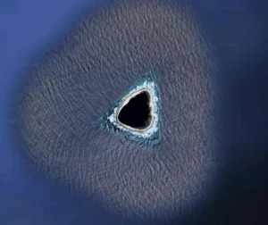 a triangular island with a black appearance
