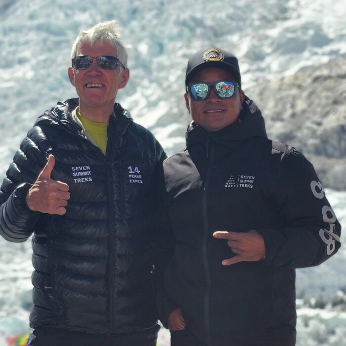 The climbers give a thumbs up at Everest Base Camp