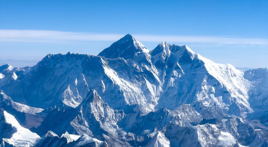 Nuptse, Everest, and Lhotse from the air on a clear day.