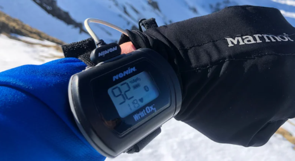 wrist-held monitor of vital signs on a climber