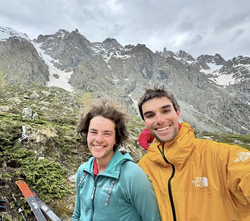 selfie of two smiling alpinists
