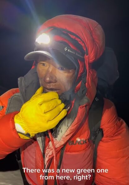 Sanu sherpa with head lamp and read dawn suit