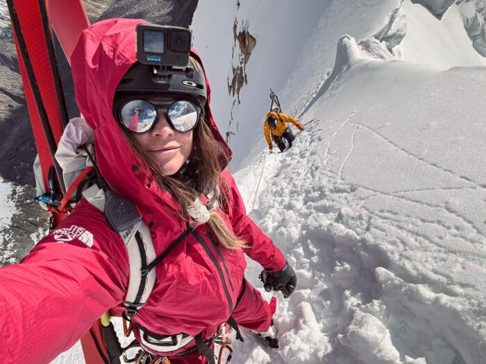 Christina Lustenberg with skis on her back while climbing Great Trango Tower in Pakistan