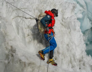 Andrews descends down an ice ledge on an otherwise vertical section of the Khumbu Icefall
