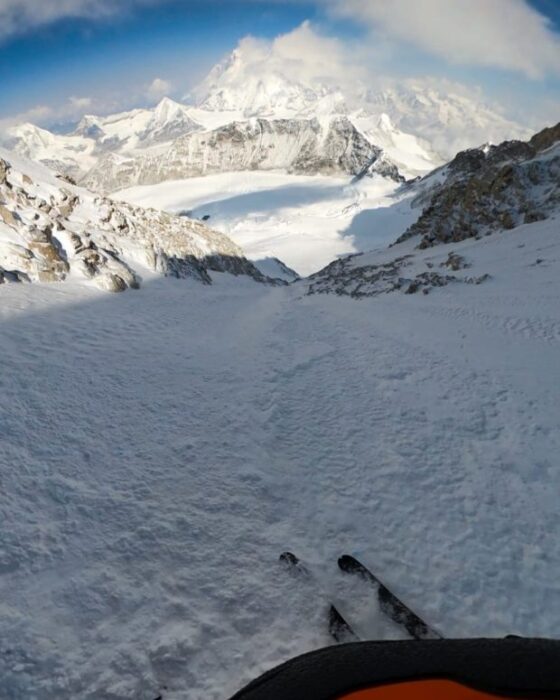 The pair of skis while descending toward the Himalayan glaciers at the foot of Makalu