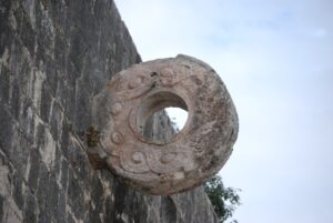 A decorative carved ring on the wall of a ballcourt in the ancient Maya city of Chichen Itza