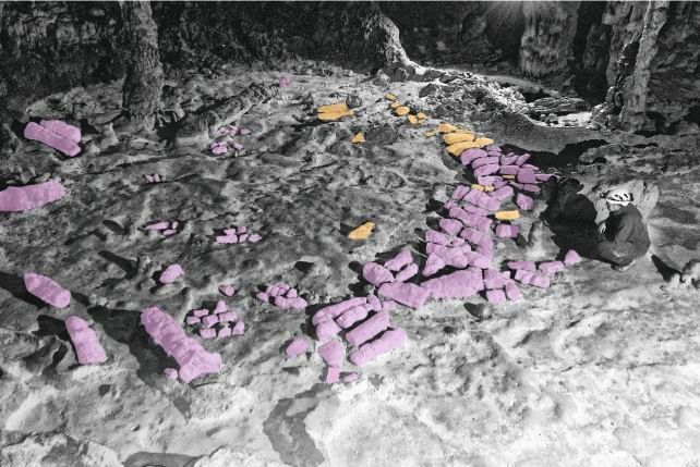 Bits of broken stalagmites (purple) and boulders (orange) were purposefully arranged 8,000 years ago