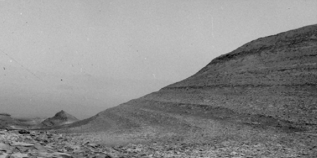 black and white footage of a windy martian hillside