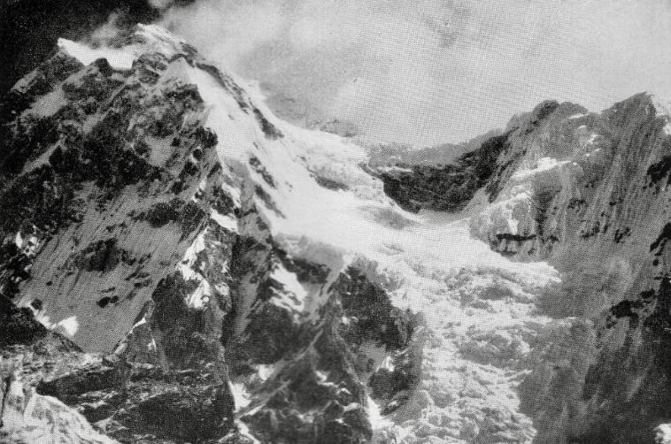 The southwest face of Jannu from the Yamatari glacier. Rock Spur left of icefall; Intermediate PLateau centre; summit in cloud on left skyline. 1957.