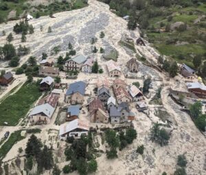 the houses of La Berarde flooded in water and mud