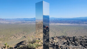 a silver monolith in the desert