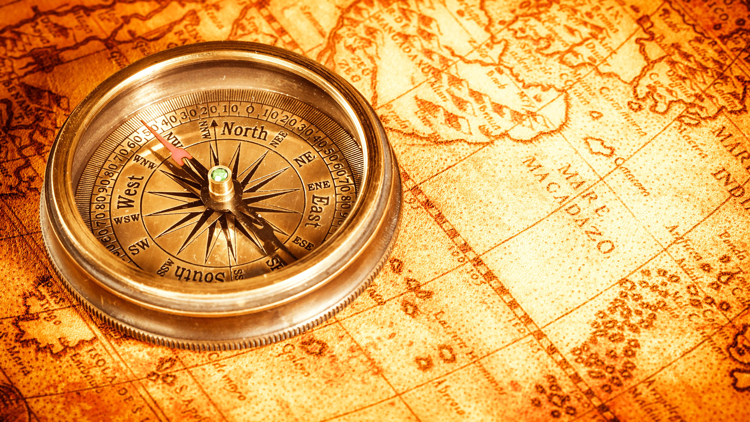 an old map and compass