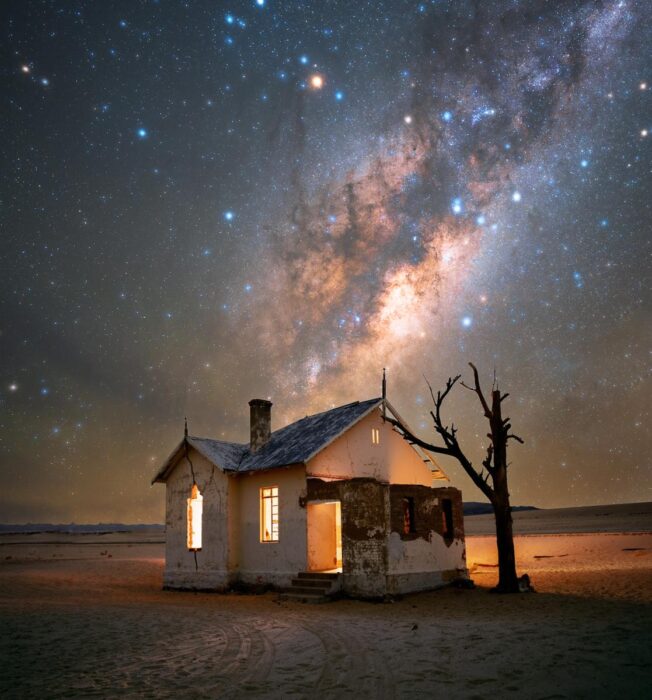 a house with the milky way overhead