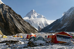 Tents on the glacier and K2 in background.