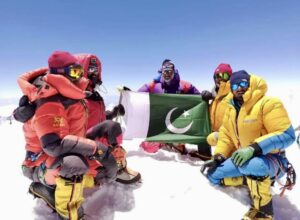 Members of Karakorum Expeditions on the summit.