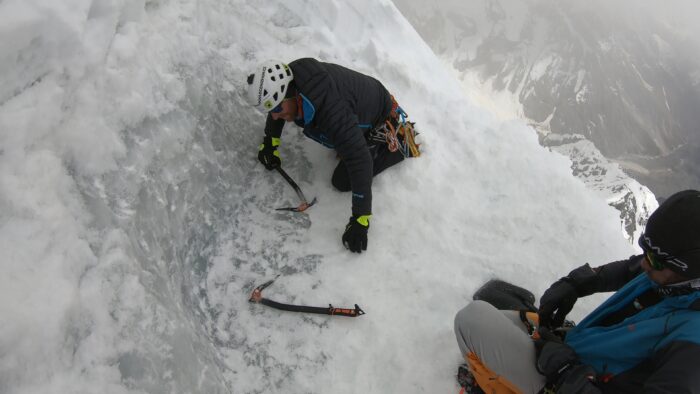 Hard ice under the layer of fresh snow