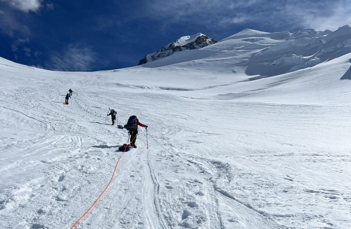 skiers head uphill on Denali