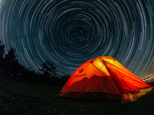Light tent at night, circle of stars overhead