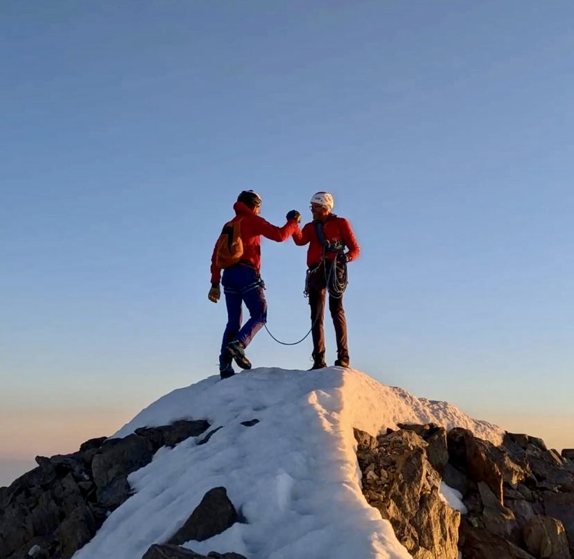 Von Kanel and Maurer on one of the 82 Alpine summits. 