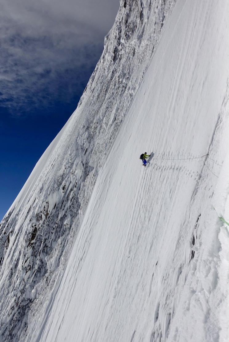 Kenro Nakajima traverses steep ice toward the route's crux at about 6,500m on Shispare.