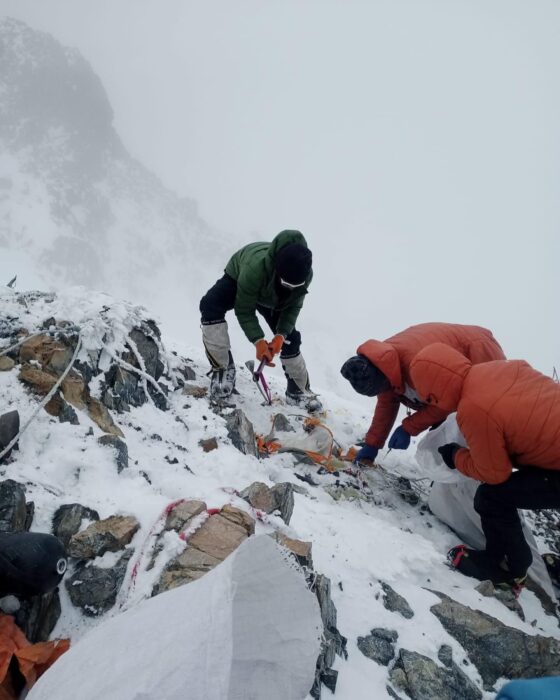 The clean-up team in action on K2. 