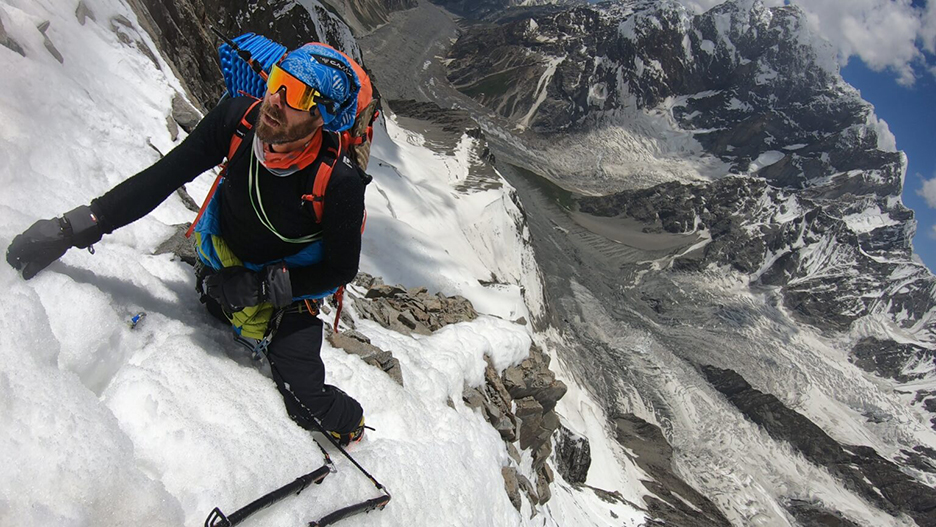 The climber on steep mixed terrain 