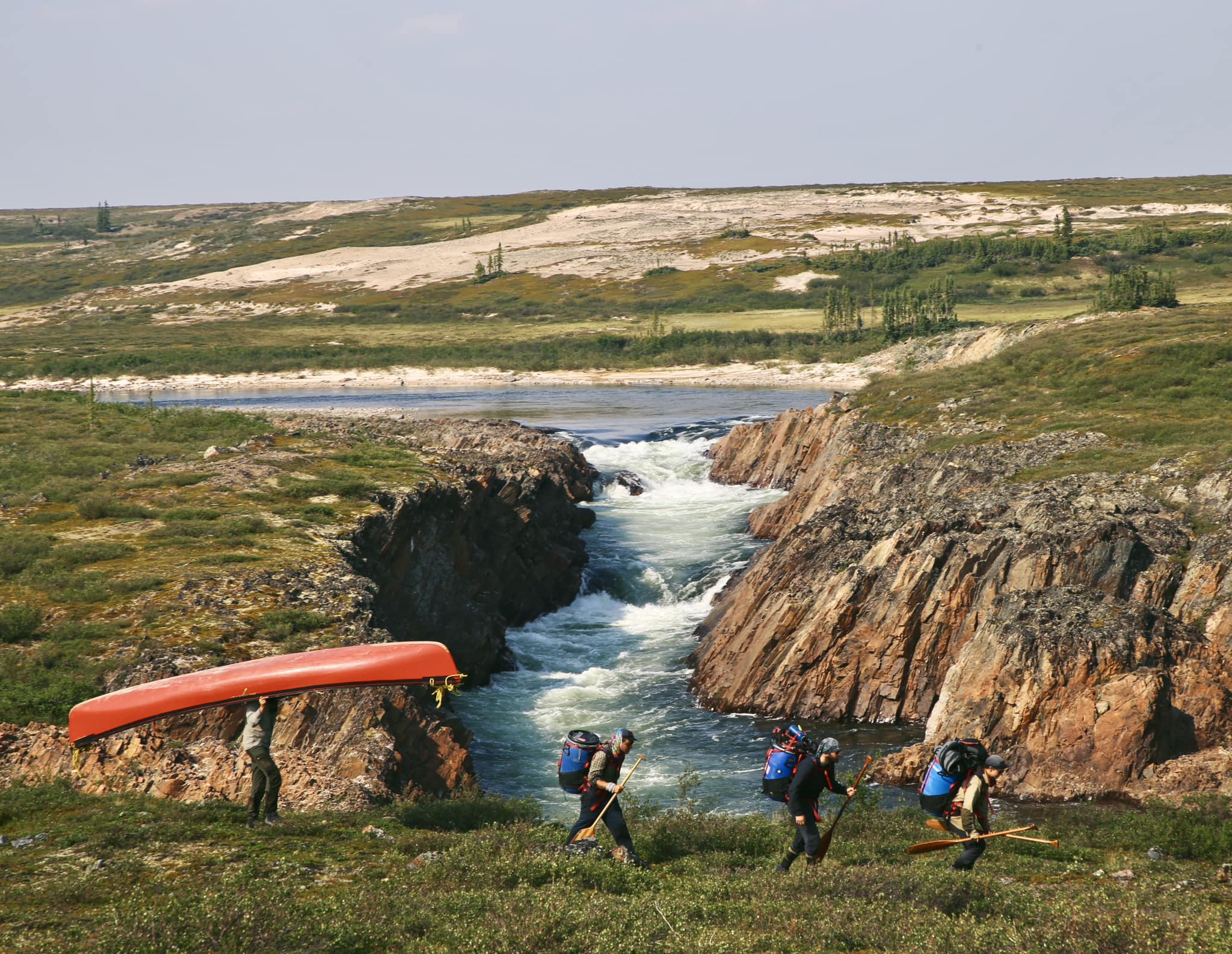 Portaging in the Arctic.