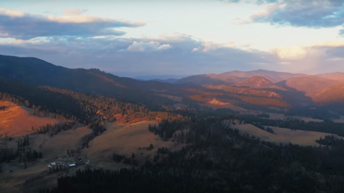 a mountain view at dusk