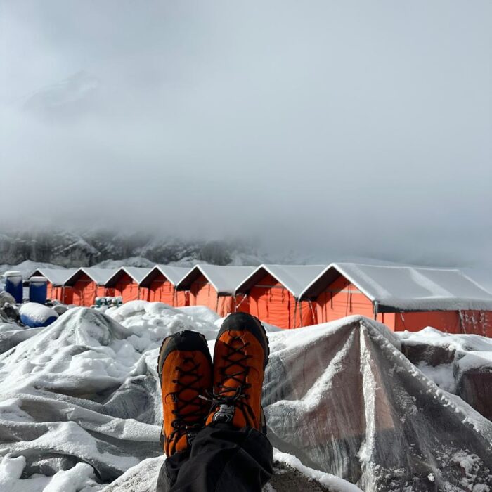 tents at a snowy Cho Oyu Base Camp