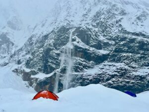 small tent on a snowy Dhaulagiri