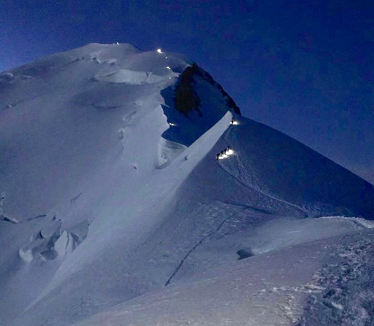 The upper slopes of Mont Blanc at night.