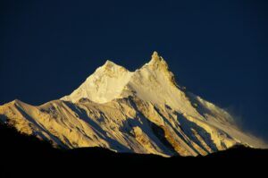 Manaslu with its carachteristic double summit in the morning sunlight