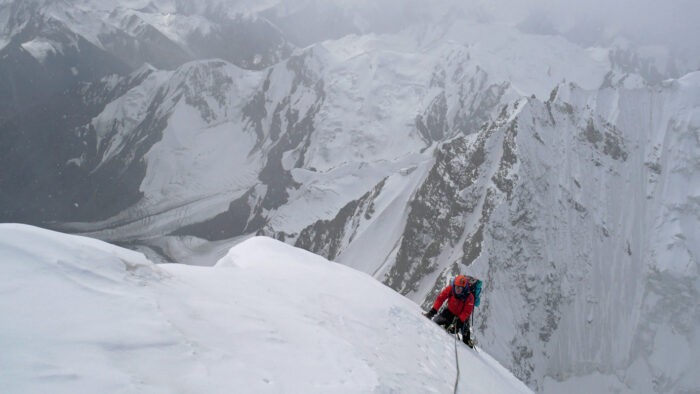 Mick Fowler climbs in heavy snow at 6,250m near the summit of Yawash Sar