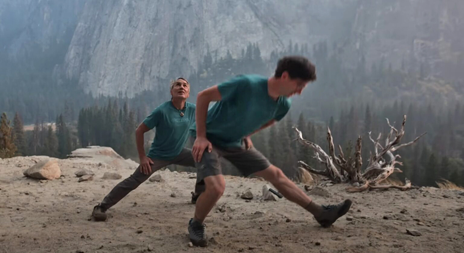 two men stretching outdoors