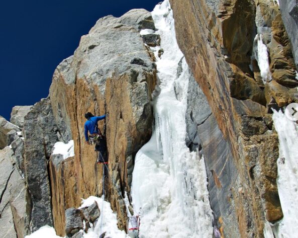 The climber on a mixed, vertical face