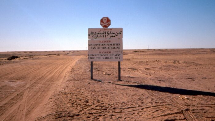 a warning sign in the desert