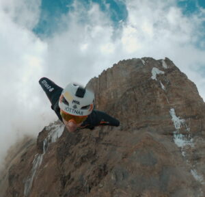 GoPro shot of Tim Howell with the face of Kilimanjaro behind him