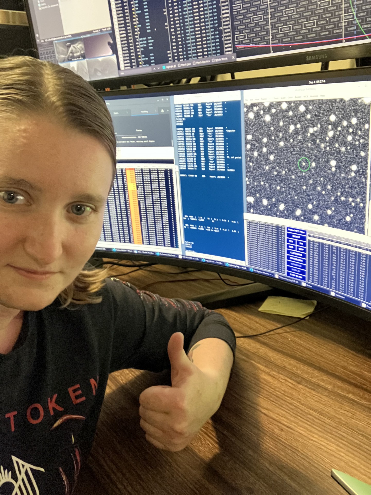 A woman gives a thumbs up in front of a series of sky photos.