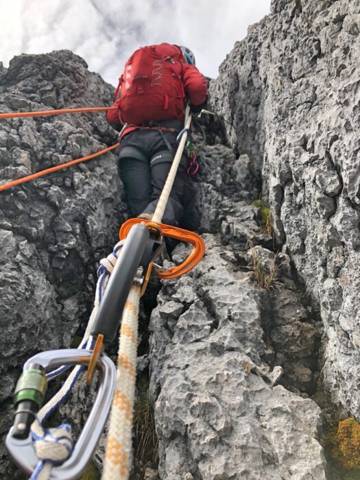 a climber on a rocky gully.